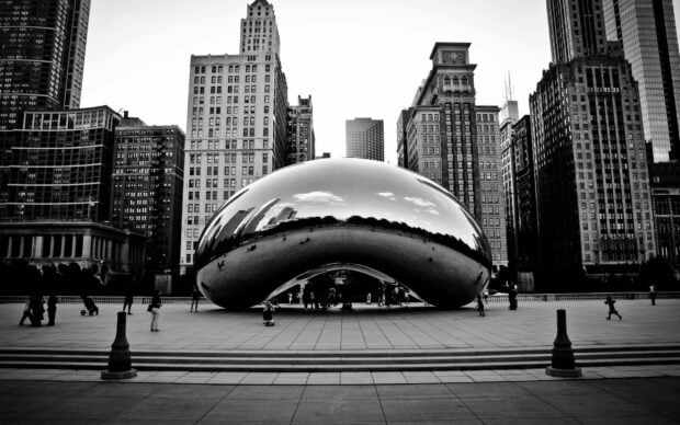 The Cloud Gate Chicago showcases the city skyline in a curved metallic surface, 2K Desktop Wallpaper