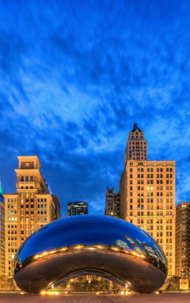 The Cloud Gate Chicago reflects city lights at dusk with surrounding architecture, HD Mobile Wallpaper