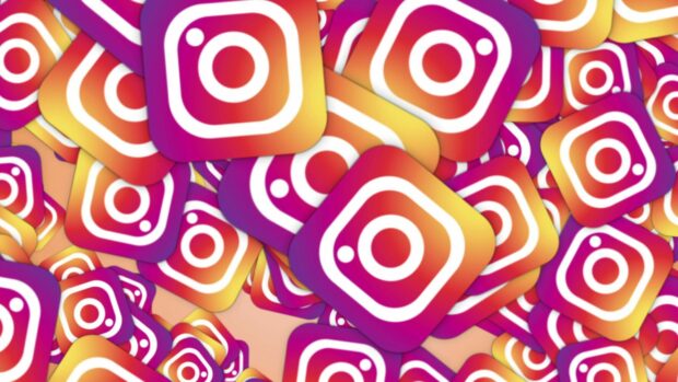 Colorful Instagram logos are stacked together in a vibrant pattern suitable for Instagram Wallpapers, 2K Desktop Wallpaper