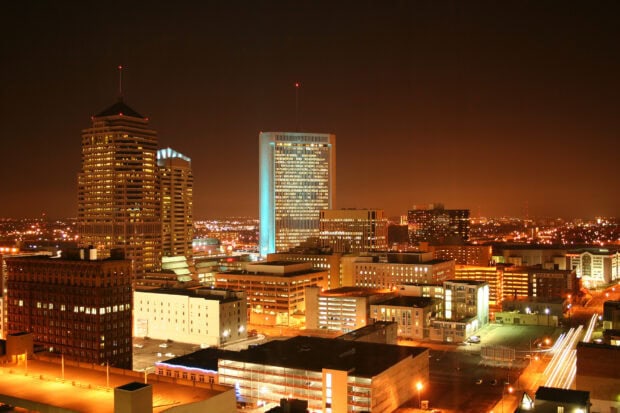 Downtown Columbus Ohio cityscape with illuminated buildings at night
