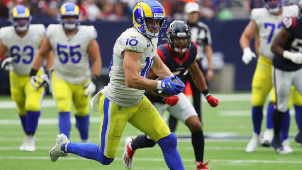 Cooper Kupp running with the football during an American football game