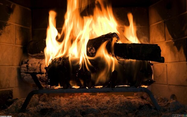 A warm fire burning on logs inside the fireplace with glowing embers, HD Desktop Wallpaper