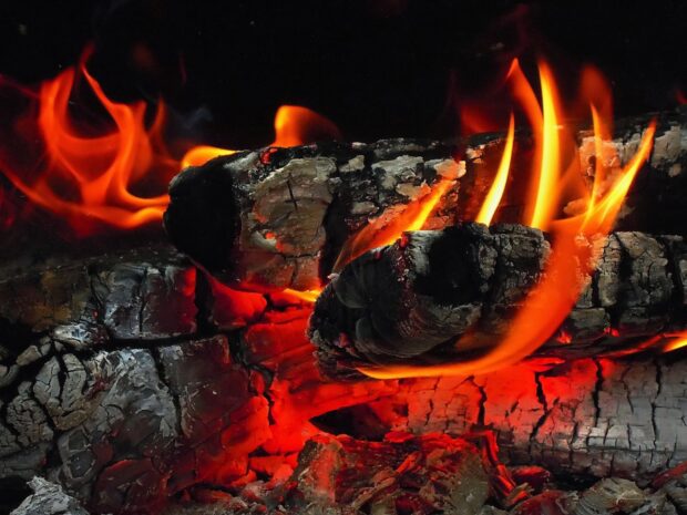 The fireplace wallpapers show glowing flames on charred logs, HD Desktop Wallpaper