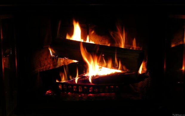 A cozy fireplace flames burning brightly inside a dark room, HD Desktop Wallpaper