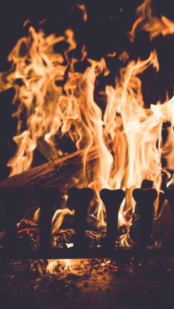 A close up of burning logs and glowing flames in a fireplace, HD Phone Wallpaper