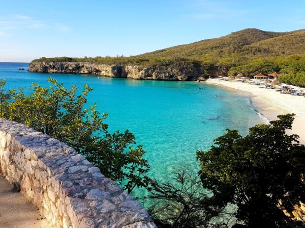 Clear turquoise sea and rocky coastline of Curacao Island
