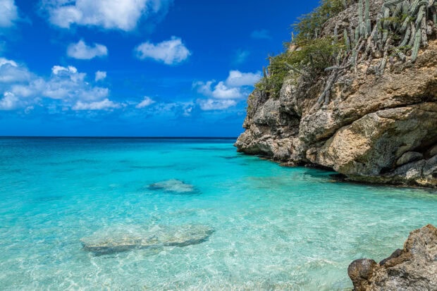 Clear turquoise water near rocky shore on Curacao Island