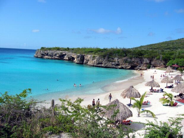 A tropical beach with crystal clear turquoise water on Curacao island