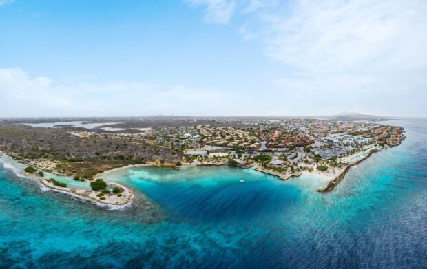 Aerial view of Curacao island with vibrant turquoise waters and coastal landscape