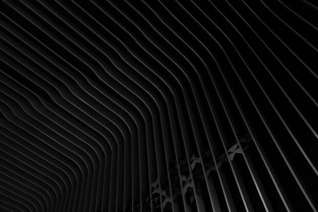 Curved matte black design with layered structural lines creating depth and shadows, 2K Desktop Wallpaper