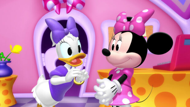 Daisy Duck wearing a purple dress and bow talking to Minnie Mouse in a colorful room