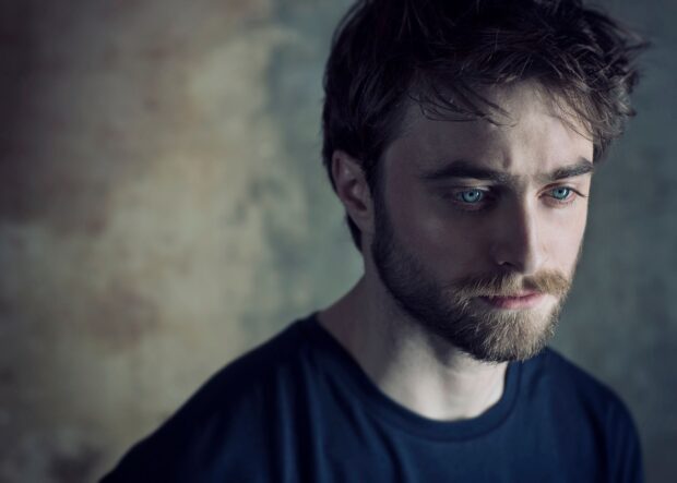 Daniel Radcliffe with blue eyes and beard in thoughtful mood, HD Desktop Wallpaper