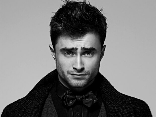 Daniel Radcliffe looks serious in a black and white portrait, HD Desktop Wallpaper