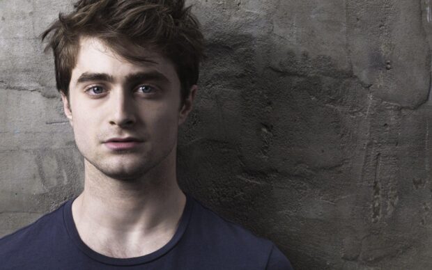 Daniel Radcliffe wallpapers showing a close up portrait against a textured wall, HD Desktop Wallpaper