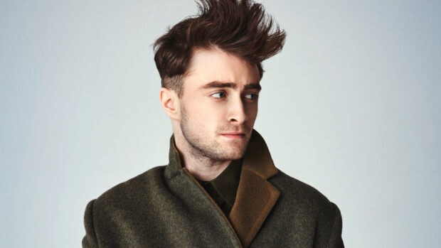 Daniel Radcliffe looks thoughtfully away wearing a coat, HD Desktop Wallpaper