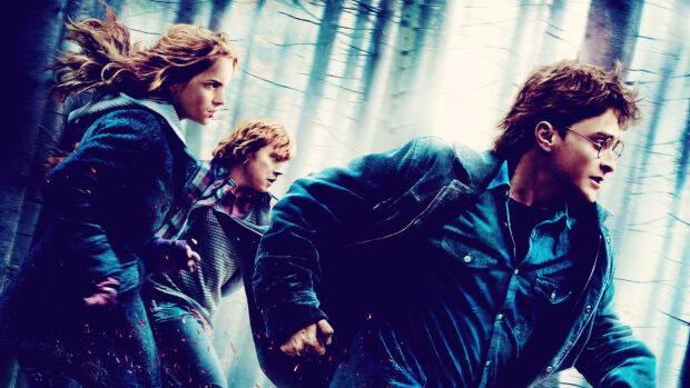 Daniel Radcliffe is running with others in a dense forest setting, HD Desktop Wallpaper