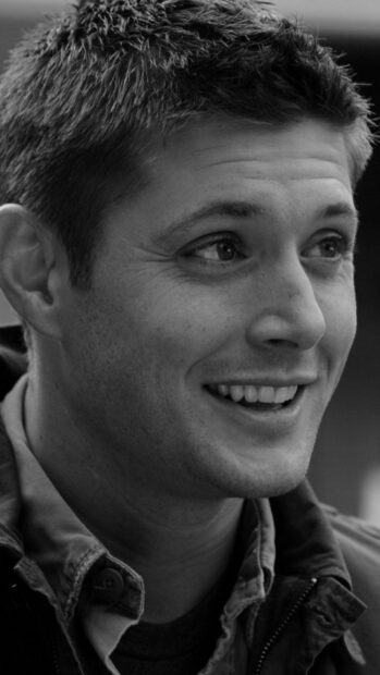 Smiling close up portrait of Dean Winchester showing his joyful expression
