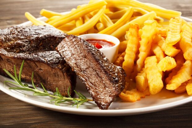 A plate of French fries and grilled steak with ketchup and rosemary, HD Desktop Wallpaper