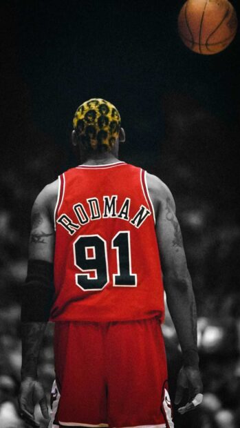 Dennis Rodman with unique hair design wearing red basketball jersey number 91 viewed from the back