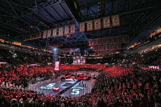 Detroit Red Wings hockey arena filled with fans during a jersey retirement ceremony