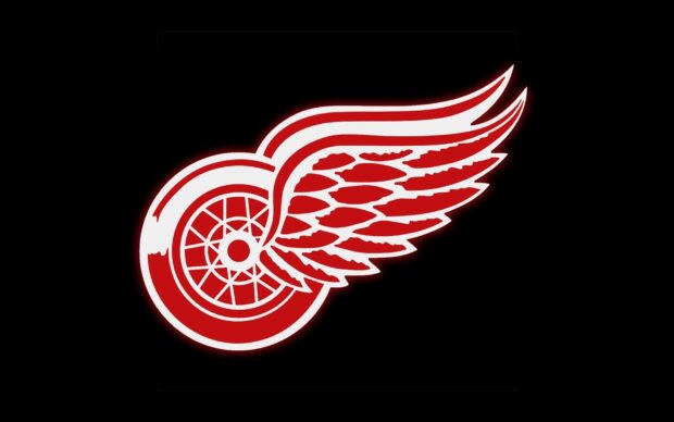 The Detroit Red Wings logo with a red wing and wheel on a black background
