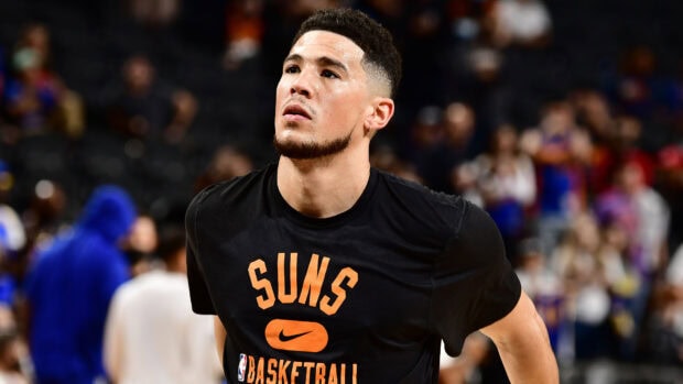Devin Booker is focused during a Suns basketball practice session, HD Desktop Wallpaper