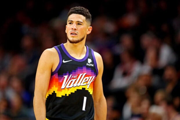 Devin Booker is focused during a basketball game wearing The Valley jersey, 2K Desktop Wallpaper