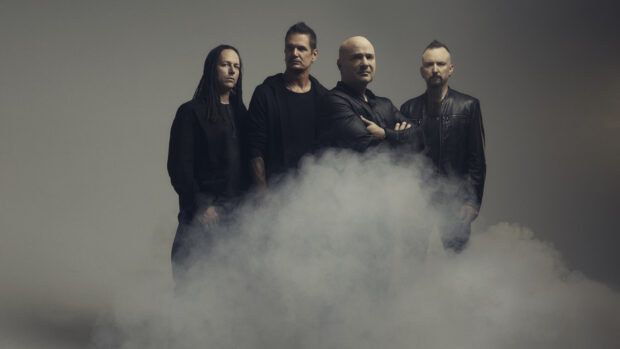 Disturbed Wallpapers featuring four band members standing in fog with serious expressions, HD Desktop Wallpaper
