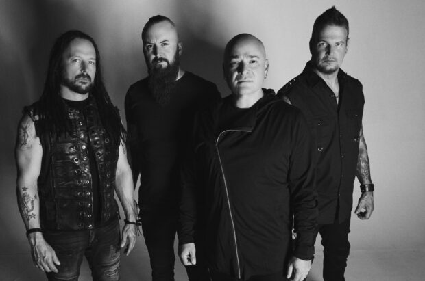The four members of Disturbed stand united for a promotional shot, 2K Desktop Wallpaper
