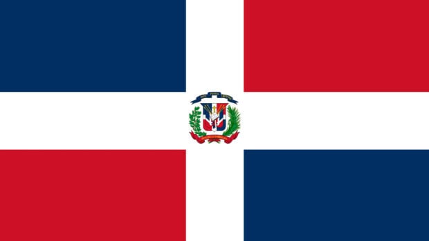 The Dominican Republic flag with a central coat of arms and blue and red quarters, 4K Desktop Wallpaper