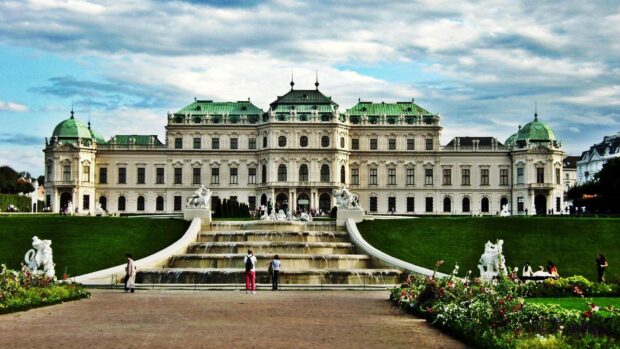 The grand Austria architecture stands with royal gardens and visitors around, HD Desktop Wallpaper