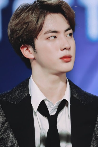 A close up of Jin Bts wearing a suit and tie with a thoughtful expression, HD Phone Wallpaper