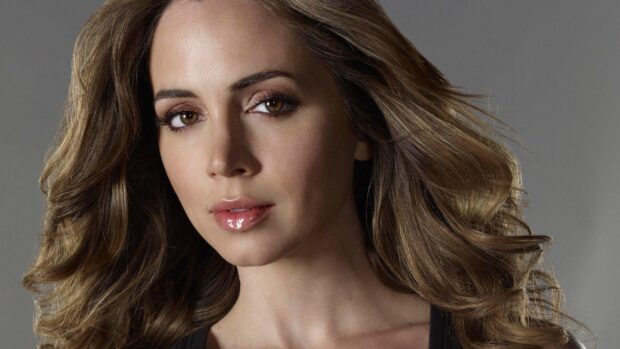 Eliza Dushku portrait with flowing hair and natural makeup for desktop