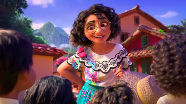 A joyful Encanto character interacts with children in the vibrant village, HD Desktop Wallpaper