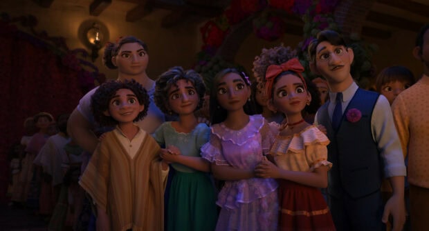 The Encanto characters are standing close and looking ahead in a warm setting, HD Desktop Wallpaper