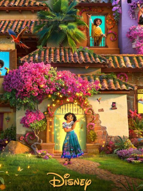 A joyful character stands in front of a vibrant house surrounded by flowers and magic in Encanto Wallpapers, HD Mobile Wallpaper