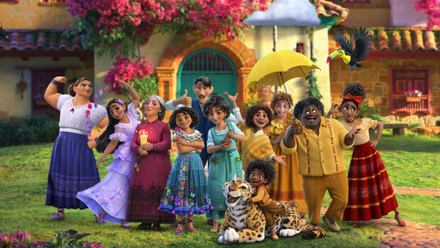 The Encanto family is posing happily together outside a colorful house, 4K Desktop Wallpaper