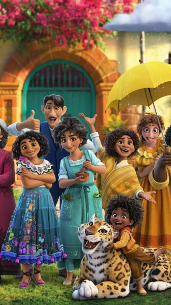 The Encanto family stands happily in a garden with colorful flowers and a joyful atmosphere, 2K Phone Wallpaper