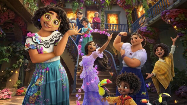 The happy Encanto family members gather joyfully in a colorful courtyard, 4K Desktop Wallpaper