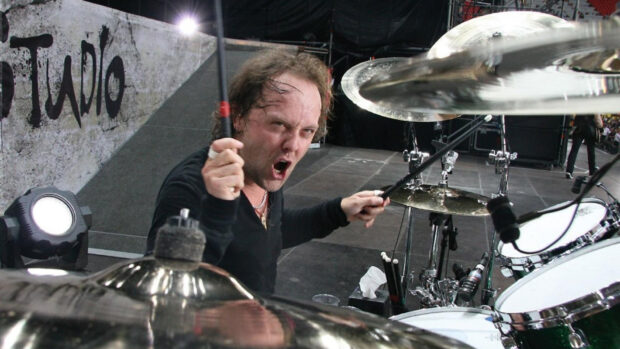 Lars Ulrich passionately playing drums during a live concert, HD Desktop Wallpaper