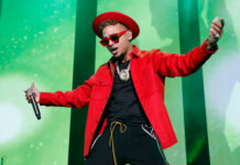 Ozuna Wallpapers captured during an energetic live performance with colorful lighting, HD Desktop Wallpaper