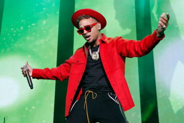 Ozuna Wallpapers captured during an energetic live performance with colorful lighting, HD Desktop Wallpaper