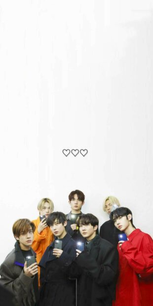 The Enhypen members are posing with their phones lighting up in a white room, HD Phone Wallpaper