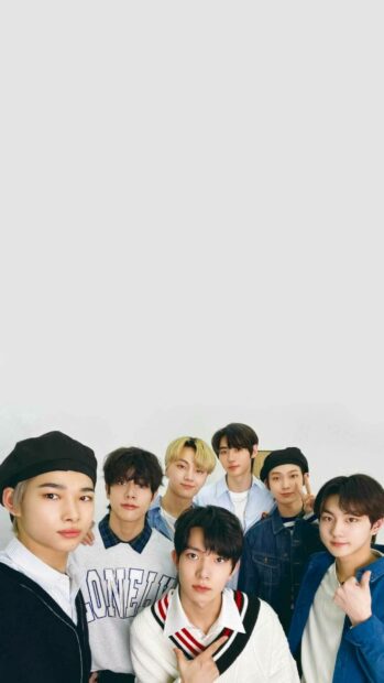 A group portrait features Enhypen with casual outfits and friendly expressions, HD Phone Wallpaper
