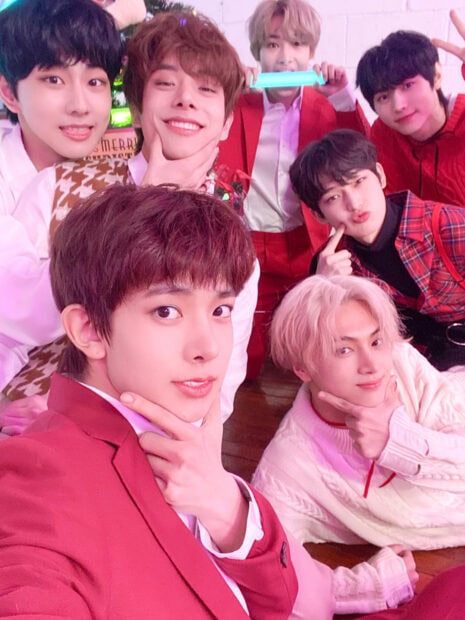 The Enhypen members are posing happily for a group selfie, HD Phone Wallpaper
