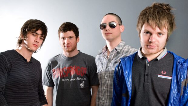 A portrait of Enter Shikari band members standing together in casual clothes, HD Desktop Wallpaper