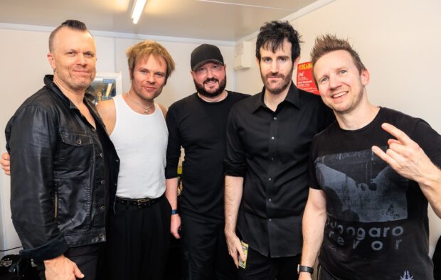 Five members of Enter Shikari band posing for a photo indoors, HD Desktop Wallpaper