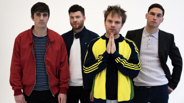 The Enter Shikari band members stand in casual clothing with a white background, HD Desktop Wallpaper