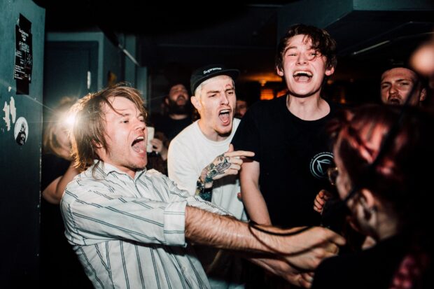 Enter Shikari band passionately performing at a live concert with energetic fans, HD Desktop Wallpaper