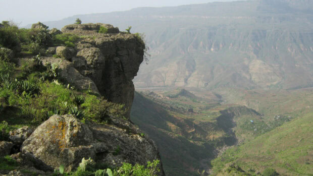 The Ethiopian highland cliffs and valleys show unique geological formations with green vegetation, HD Desktop Wallpaper